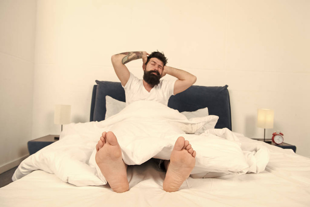 Reasons you are waking up too early. Man bearded hipster woke up too early and feels sleepy and tired. Early to get up. Keep you wide awake in the early morning hours. Insomnia and sleep problems - Φωτογραφία, εικόνα