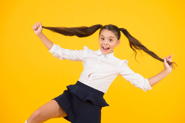 Positive vibes. School life concept. Celebrate knowledge day. Student little kid. Girl pupil on yellow background. Back to school. Emotional school girl. Successful graduation. Happy childrens day - Foto, immagini