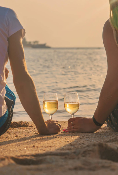 Drink wine by the sea. Selective focus. - Photo, Image