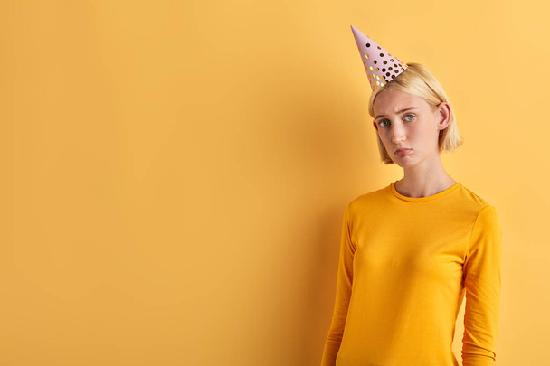 sad young beautiful woman doesnt like birthday party - Photo, Image