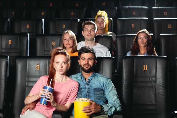 young people addicted to cinema - Foto, afbeelding