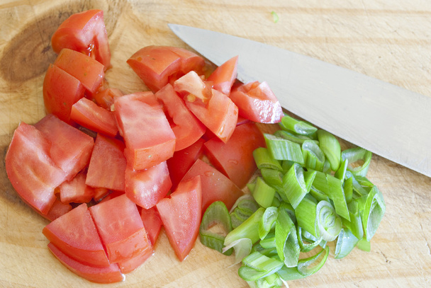 Chopped tomatoes and onions - Photo, image