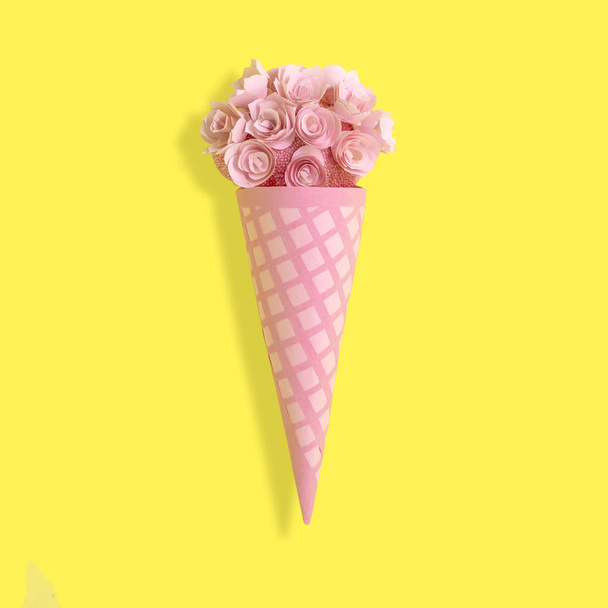 Paper waffle cone with flowers  - Foto, Bild