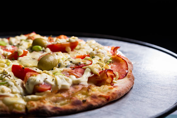delicious Italian pizza on the table  - Foto, Bild