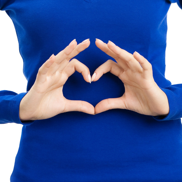 Woman showing heart symbol gesture, isolated - Fotografie, Obrázek