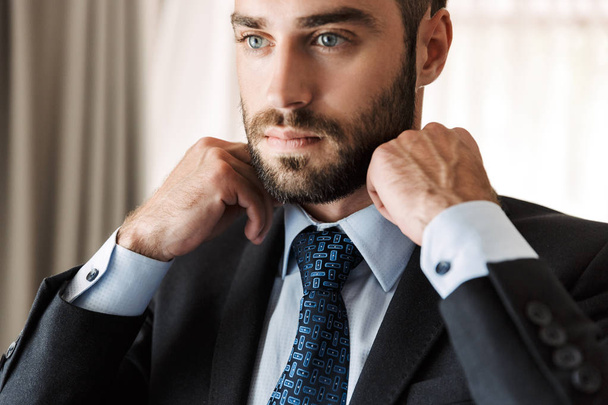 Cropped image of an attractive young businessman - Foto, immagini