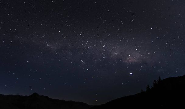 A beautiful shot of the starry sky in the middle of the night in Queenstown, New Zealand - Fotó, kép