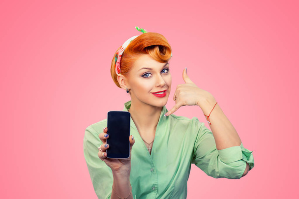 Call me. Pin up style girl showing phone blank screen - Foto, immagini