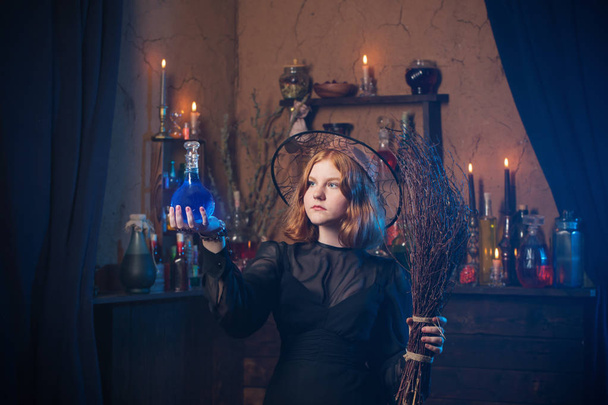 young witch in home. Halloween concept - Foto, Imagem