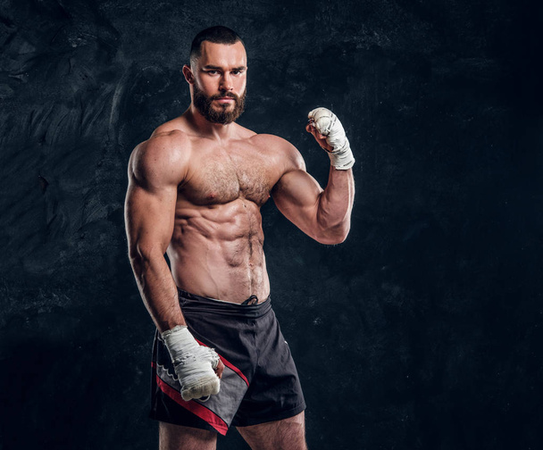 Portrait of muscular fighter with nacked torso - Fotoğraf, Görsel