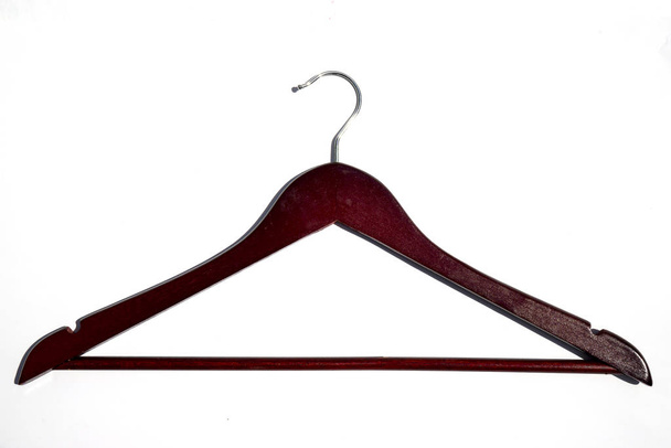Wooden coat hanger isolated on white background. - Photo, Image