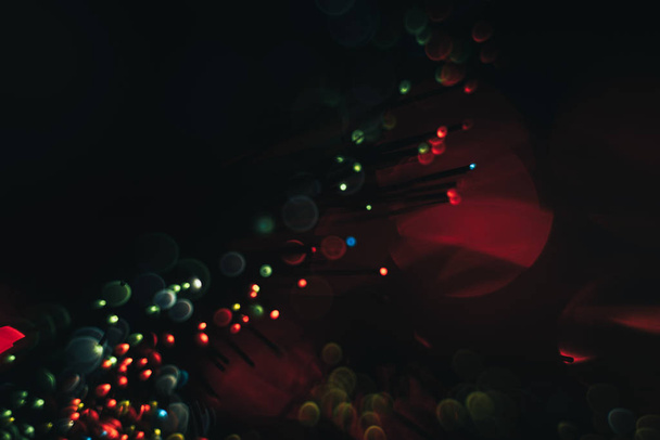 Beautiful multi colored bokeh background on a dark. - Foto, Imagen