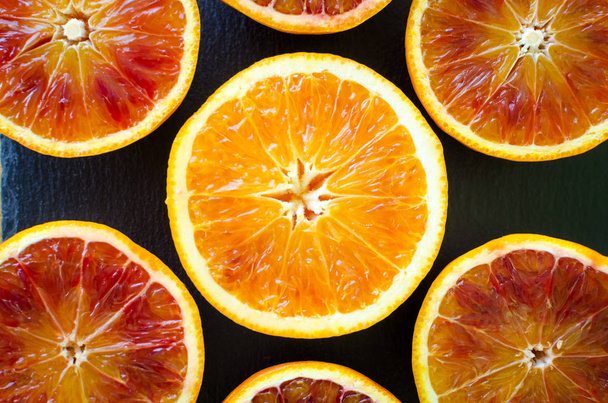 Textura de laranjas de sangue fatiadas
 - Foto, Imagem
