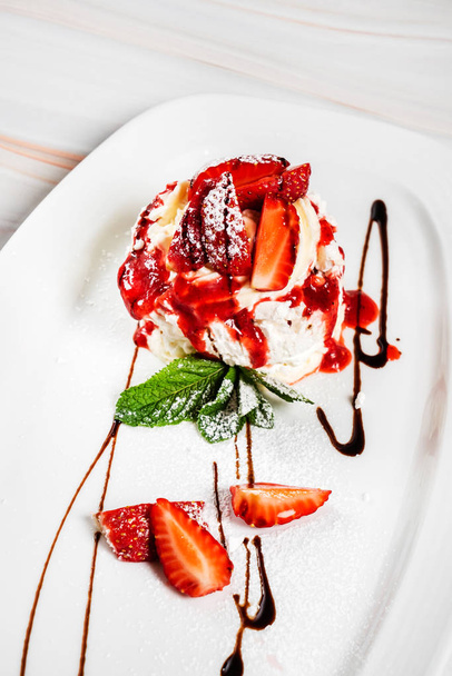 dessert with strawberries and ice cream - Photo, image