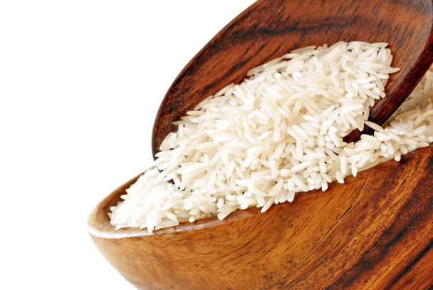 arroz en un tazón sobre un fondo blanco - Foto, imagen