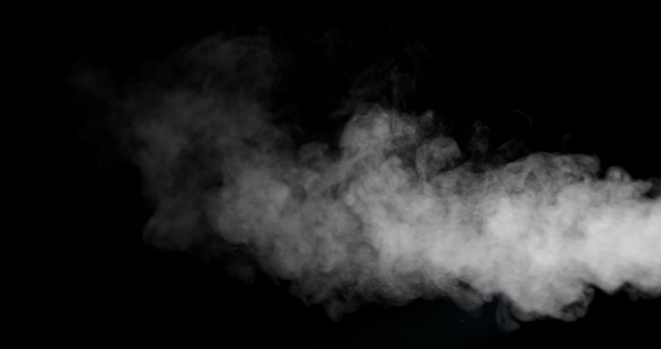 Білий дим Trail ізольований на чорному фоні - Фото, зображення