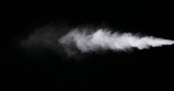 White Smoke Trail Isolated on Black Background - Photo, Image