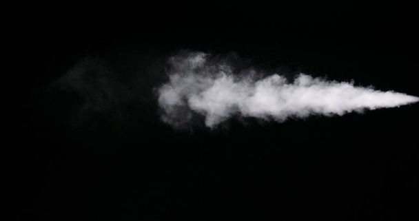 White Smoke Trail izolowane na czarnym tle - Zdjęcie, obraz