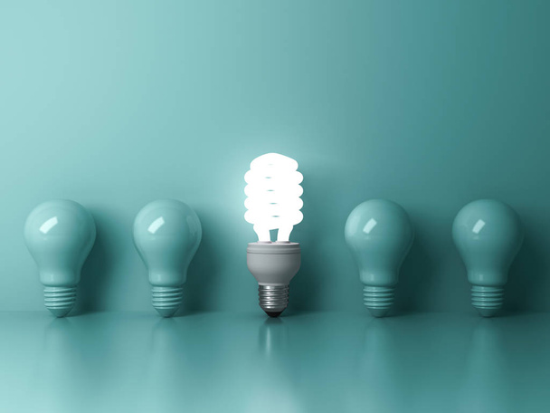 Energy saving light bulb , one glowing compact fluorescent lightbulb standing out from unlit incandescent bulbs on green background individuality and different creative idea concepts 3D rendering - Fotó, kép