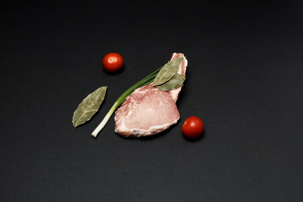 raw meat on dark background - Fotoğraf, Görsel
