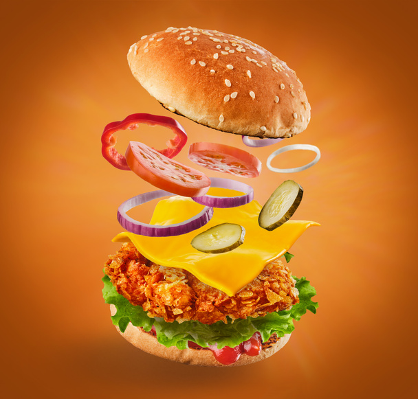 Burger con ingredienti volanti. Delizioso mostro Hamburger chee
 - Foto, immagini