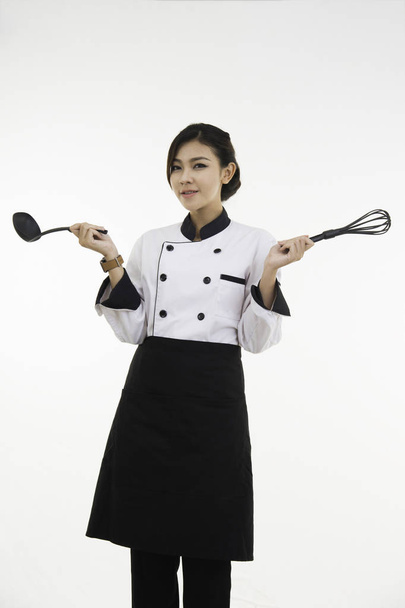 Portrait of asian young brunette chef woman isolated on white ba - Valokuva, kuva
