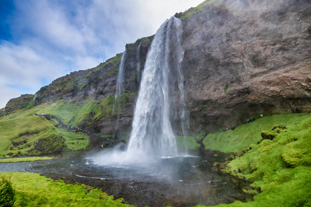 Seljalandsfoss, side view on a beautiful summer day in Iceland - 写真・画像