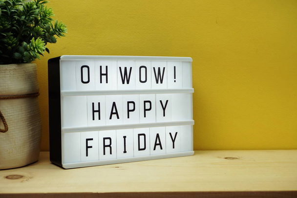 Happy Friday text in light box with space copy on yellow background - Foto, afbeelding