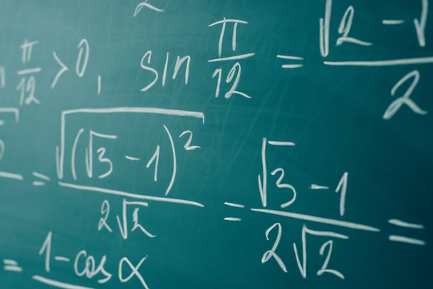 Maths formulas written by white chalk on the chalkboard - Foto, afbeelding