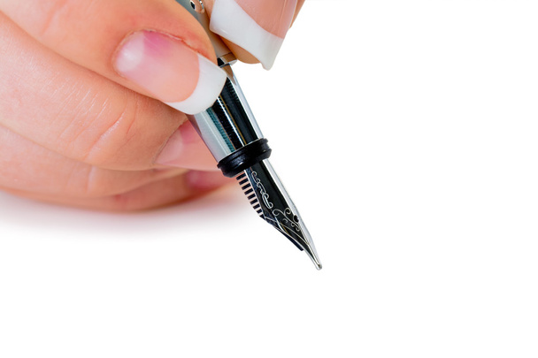 Hand with fountain pen writes under contract - Φωτογραφία, εικόνα