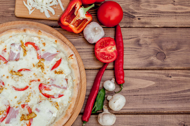 Tuscan Classic Pizza on the wooden table, top view. Vegetarian food - Fotoğraf, Görsel