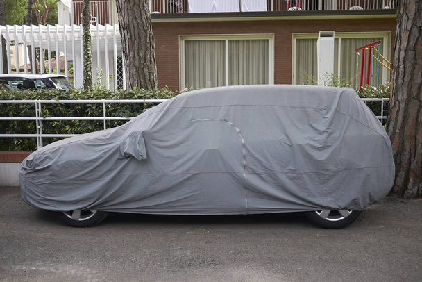 Milano Marittima, Italy -  August 07, 2019 : Car covered - Foto, afbeelding