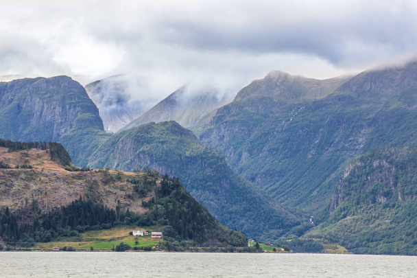 clouds over the fjord and mountains in Norway - Fotografie, Obrázek