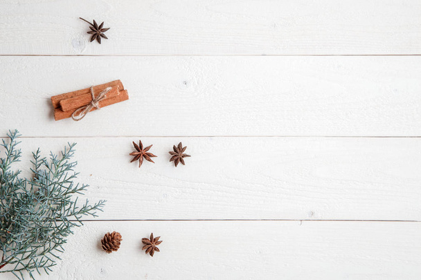 new year background. flatlay. cinnamon,anise and spruce branches - Photo, Image