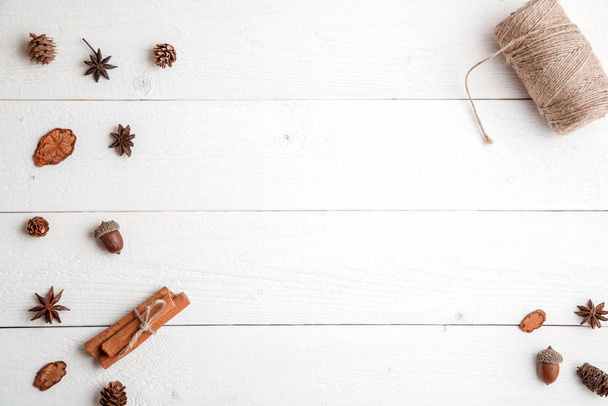 new year background. flatlay. cinnamon,fir branches on white woo - Photo, image