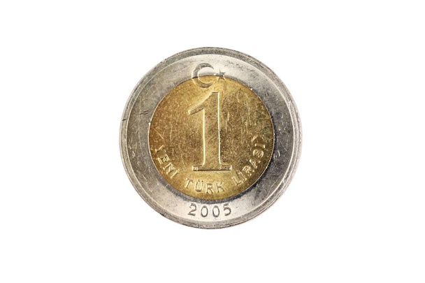 白い背景に隔離されたバイメタリックなトルコの1リラコイン、クローズアップマクロで撮影 - 写真・画像
