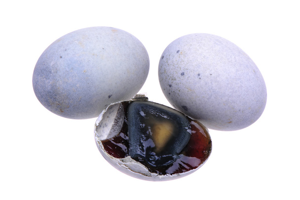 Preserved duck eggs on white background - Photo, Image