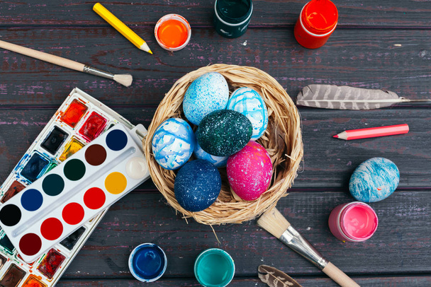 process of painting Easter eggs. Preparing for Easter. - 写真・画像
