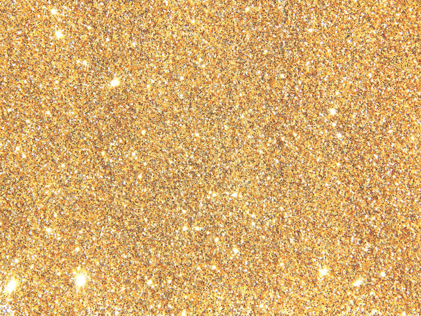 verschwommener Hintergrund mit goldenem Glanz - Foto, Bild