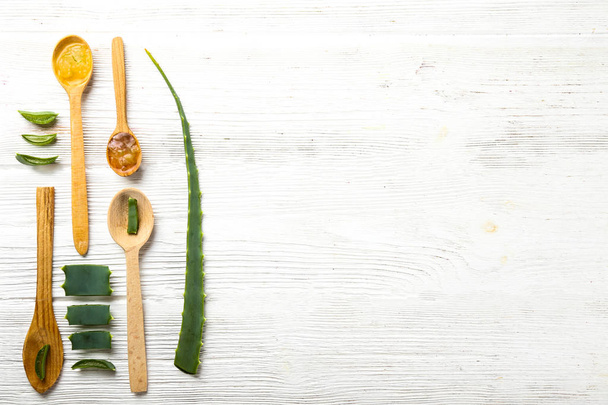 Aloe leaves laid in flat lay composition as skin nutrition concept. - Foto, imagen