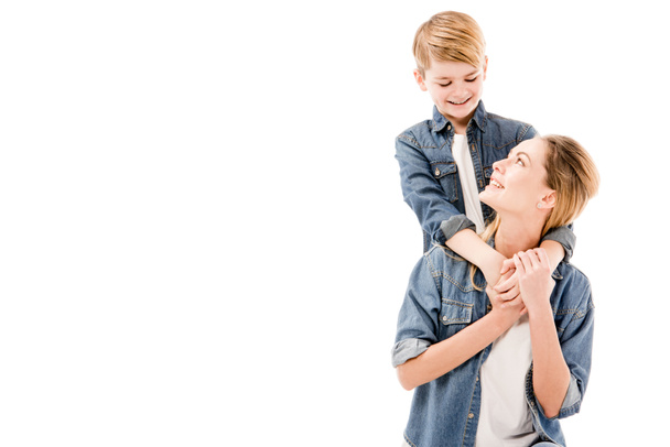 happy mother and son embracing isolated on white - Fotoğraf, Görsel