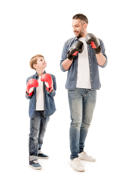 full length view of father and son in boxing gloves isolated on white - Φωτογραφία, εικόνα