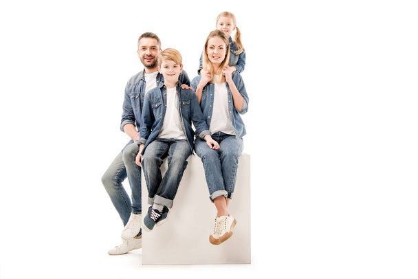 happy family in jeans looking at camera isolated on white - Photo, Image