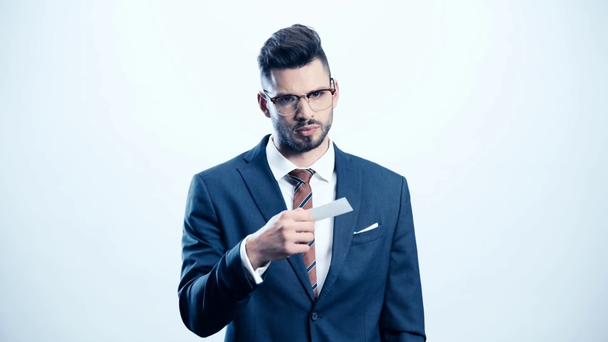 businessman in glasses taking card on white - Video, Çekim