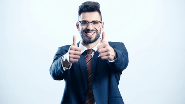 cheerful businessman showing thumbs up on white  - Footage, Video