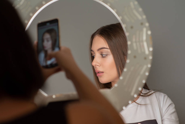 Make up. A series of photos of a model by a makeup artist. - Foto, Bild