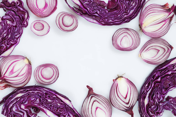 Sliced red onion and cabbage on a white background - Fotoğraf, Görsel