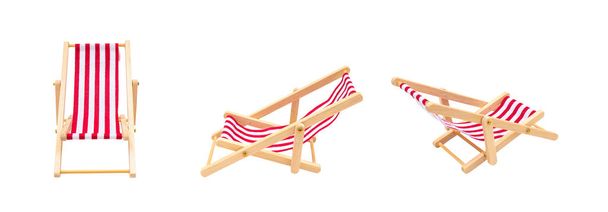 Group of wooden red beach chairs lounge isolated on white background. - Photo, Image