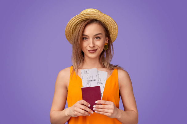 Stylish woman with tickets and passport for travel - Zdjęcie, obraz