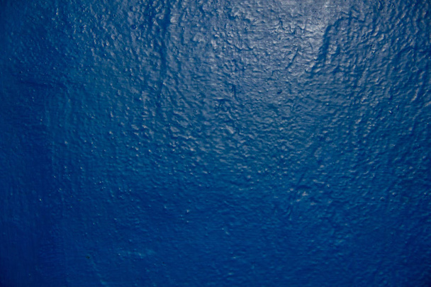 mur bleu. mur peint avec de la peinture bleue. Contexte
 - Photo, image